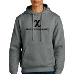 Person wearing a gray hoodie with "MAXE YOUR MARX" printed on the front, standing against a white background. The person has short blond hair and is wearing blue jeans.