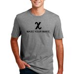A person wearing a gray t-shirt with a black "x" symbol and the text "MAKE YOUR MARX." They are standing with hands in pockets against a plain white background.